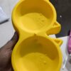 Cat Shaped Double food bowl Pet Plastic food bowl (Random Color)